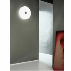 Flos Mini Button Wall Light Polycarbonate 6 Flos Mini Button Wall Light Polycarbonate -Vitra Shop Flos Mini Button Lamp Lifestyle1 1